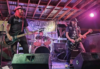 OLD DIRTY BUZZARD ROARS BACK WITH ONE FOOT IN THE GRAVE, A CRUSHING DOOM AND SLUDGE ASSAULT