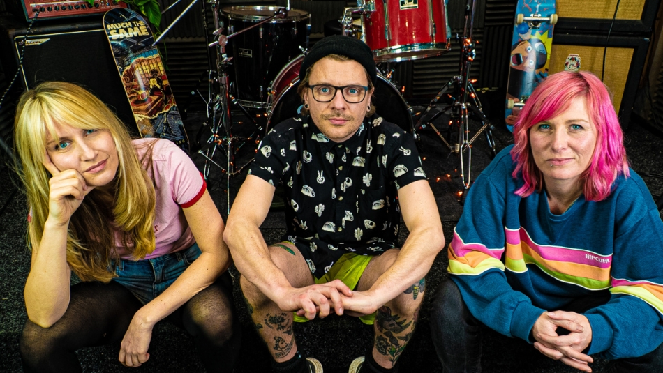 UK Punk Trio Raisin Awareness Address A World In Chaos On New Single “Never Ending Story”